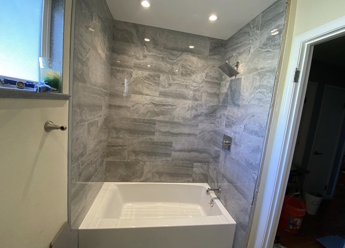 Bathroom remodel with gray tile shower